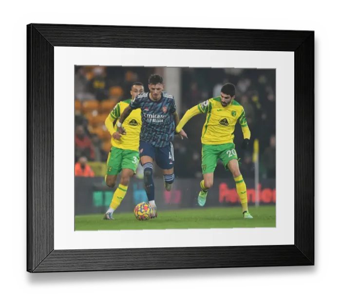 Framed Print : Arsenal's Ben White vs. Norwich's Pierre-Lees Melou: A Premier League Battle Framed Print : Arsenal's Ben White vs. Norwich's Pierre-Lees Melou: A Premier League Battle
