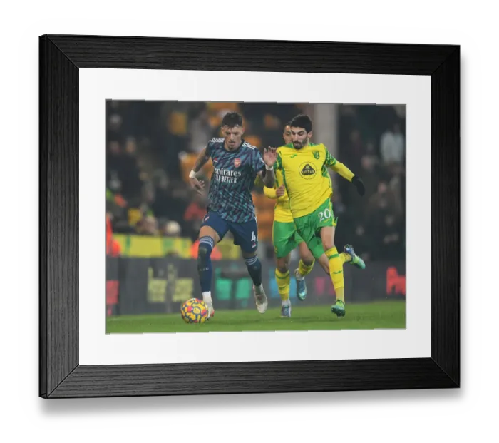 Framed Print : Arsenal's Ben White Faces Off Against Norwich's Pierre Lees-Melou in Premier League Clash Framed Print : Arsenal's Ben White Faces Off Against Norwich's Pierre Lees-Melou in Premier League Clash