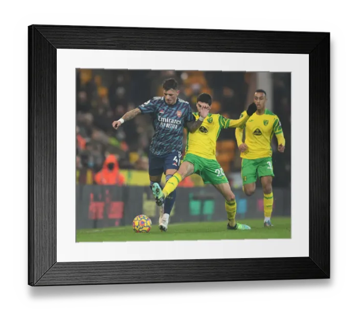 Framed Print : Arsenal's Ben White vs. Norwich's Pierre-Lees Melou: A Premier League Battle
