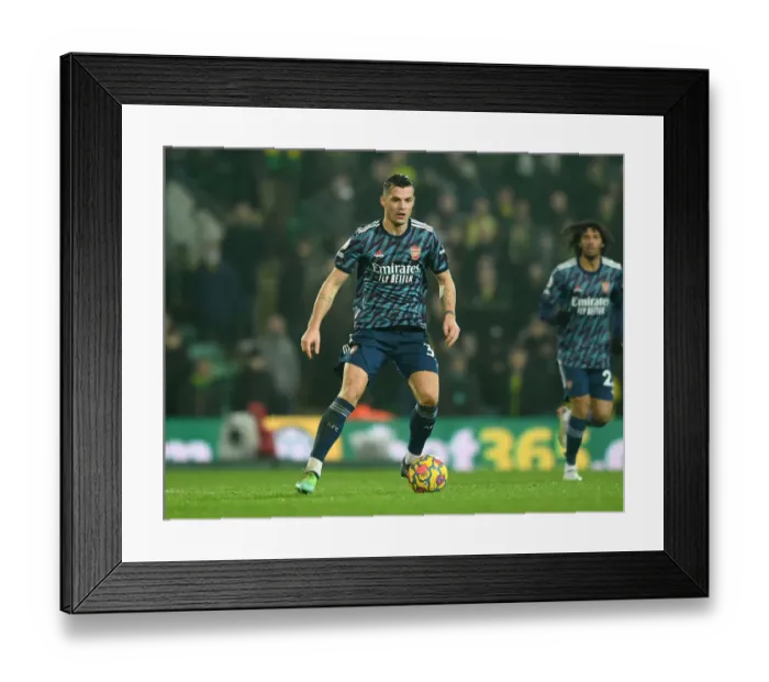 Framed Print : Granit Xhaka: Arsenal's Midfield Maestro Sparks Victory over Norwich City, Premier League 2021-22