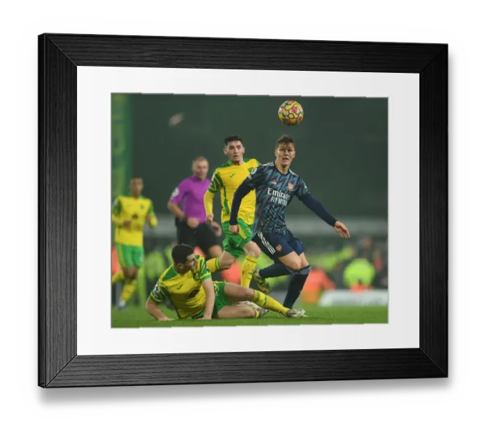 Framed Print : Odegaard Clashes with McLean: Norwich City vs. Arsenal, Premier League 2021-22