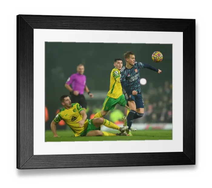 Framed Print : Odegaard Clashes with McLean: Norwich City vs Arsenal, Premier League 2021-22