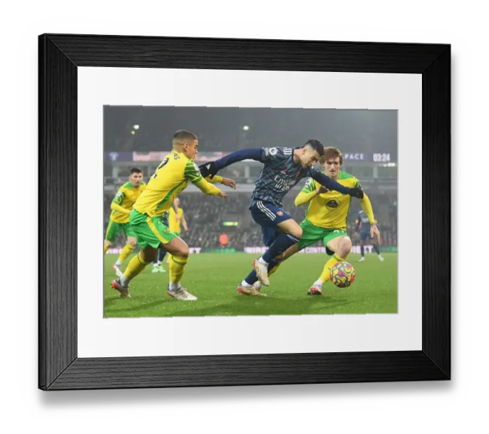 Framed Print : Martinelli Clashes with Norwich Defenders in Arsenal's Premier League Battle
