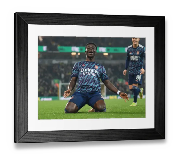 Framed Print : Saka Scores Double: Arsenal's Triumph Over Norwich City in Premier League Framed Print : Saka Scores Double: Arsenal's Triumph Over Norwich City in Premier League
