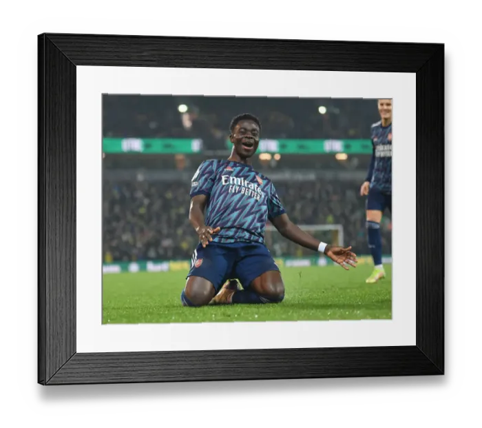 Framed Print : Bukayo Saka's Brace: Arsenal Crush Norwich City in Premier League Clash