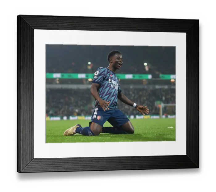 Framed Print : Saka Scores Thriller: Arsenal's 3-1 Victory over Norwich City in the 2021-22 Premier League