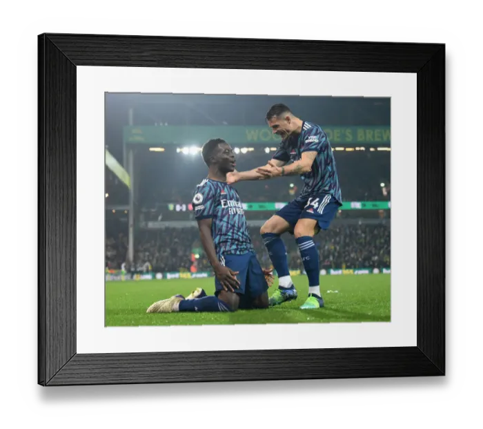 Framed Print : Arsenal's Unstoppable Partnership: Saka and Xhaka's Brilliant Goal Celebration vs. Norwich City