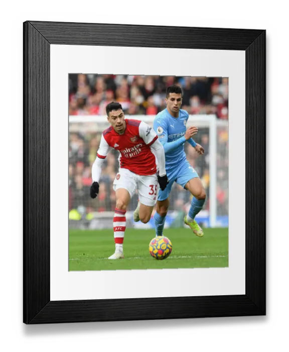 Framed Print : Martinelli vs Cancelo: A Premier League Showdown at Emirates Stadium Framed Print : Martinelli vs Cancelo: A Premier League Showdown at Emirates Stadium