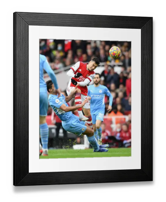 Framed Print : Arsenal vs Manchester City: Gabriel Martinelli vs Rodri - Premier League Clash at Emirates Stadium (2021-22)