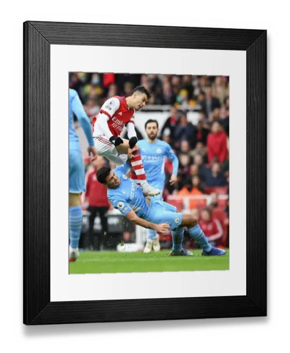 Framed Print : Martinelli vs Rodri: A Premier League Showdown at Emirates Stadium (2021-22)