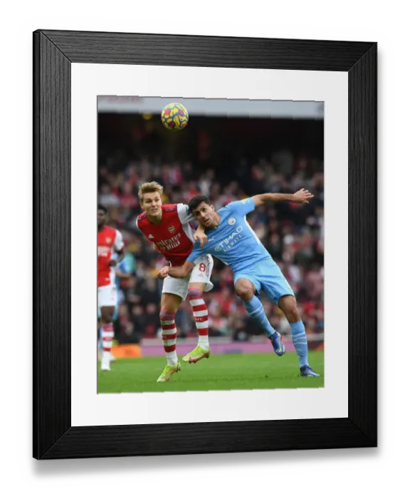 Framed Print : Clash of Titans: A Heading Duel - Odegaard vs Rodri, Arsenal vs Manchester City, Premier League Framed Print : Clash of Titans: A Heading Duel - Odegaard vs Rodri, Arsenal vs Manchester City, Premier League