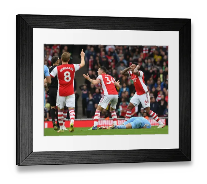 Framed Print : Arsenal's Gabriel Magalhaes Receives Red Card in Intense Arsenal v Manchester City Clash (2021-22) Framed Print : Arsenal's Gabriel Magalhaes Receives Red Card in Intense Arsenal v Manchester City Clash (2021-22)