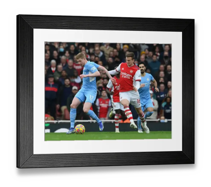 Framed Print : Arsenal vs Manchester City: Holding Holds Back De Bruyne in Intense Premier League Clash