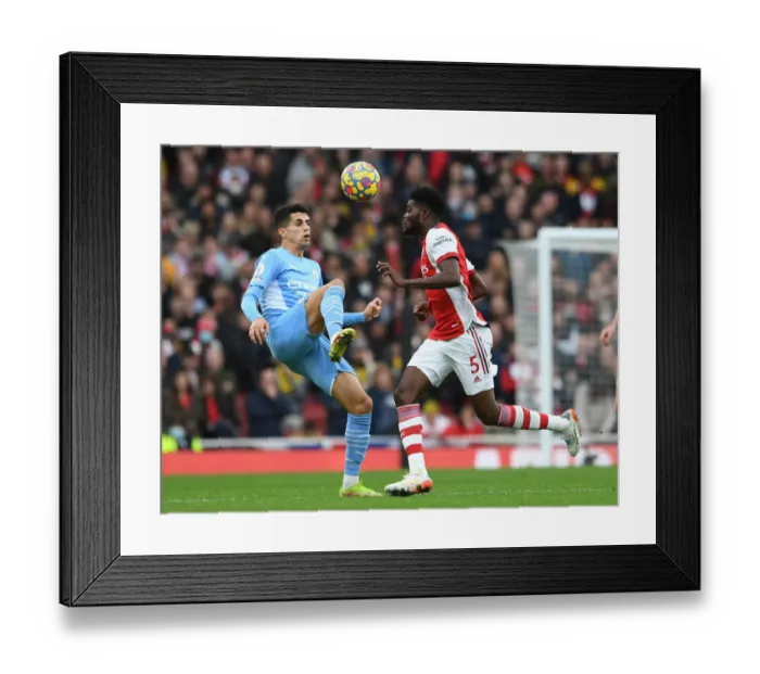 Framed Print : Thomas Partey vs Joao Cancelo: Heading Battle at the Emirates - Arsenal vs Manchester City, Premier League 2021-22