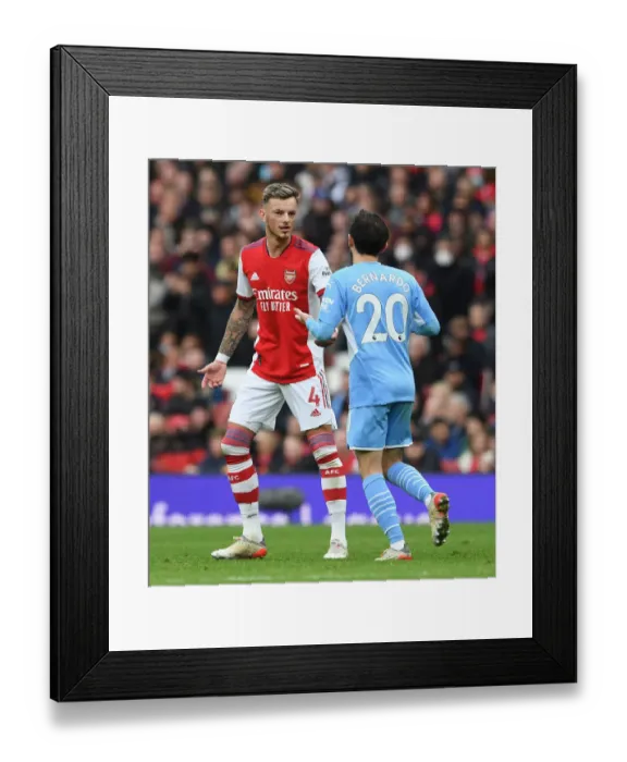Framed Print : Arsenal vs Manchester City: Ben White and Bernardo Silva in Deep Conversation during the 2021-22 Premier League Clash at Emirates Stadium Framed Print : Arsenal vs Manchester City: Ben White and Bernardo Silva in Deep Conversation during the 2021-22 Premier League Clash at Emirates Stadium