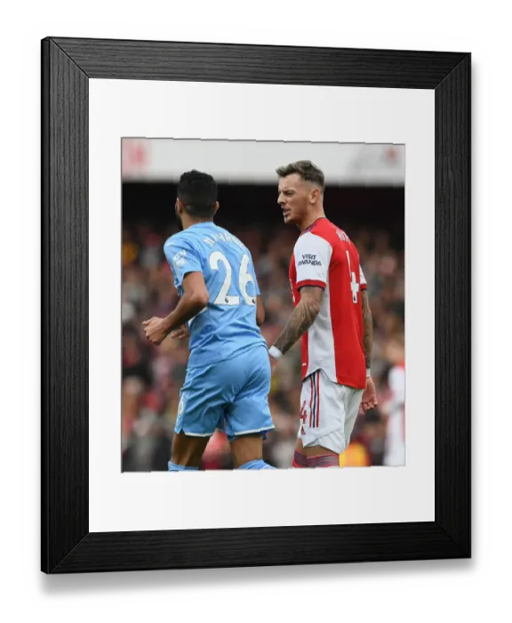 Framed Print : Intense Rivalry: White vs. Mahrez - Arsenal vs. Manchester City: A Battle of Words on the Football Field Framed Print : Intense Rivalry: White vs. Mahrez - Arsenal vs. Manchester City: A Battle of Words on the Football Field