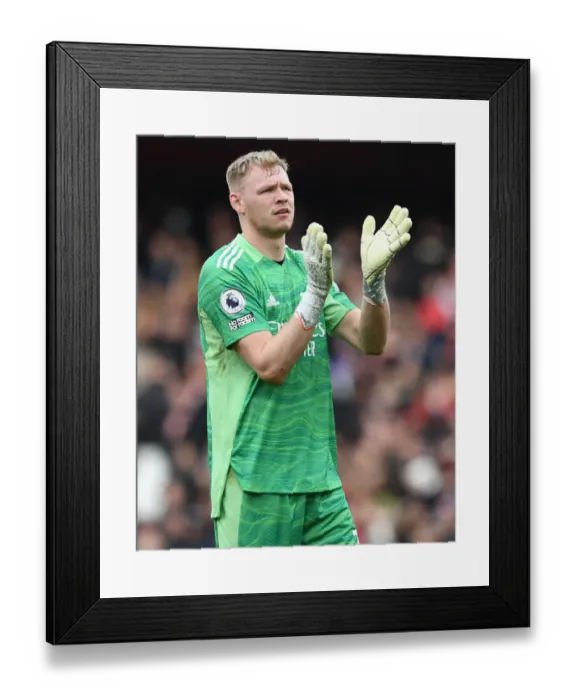 Framed Print : Arsenal's Aaron Ramsdale Celebrates Epic Win Over Manchester City with Fans Framed Print : Arsenal's Aaron Ramsdale Celebrates Epic Win Over Manchester City with Fans