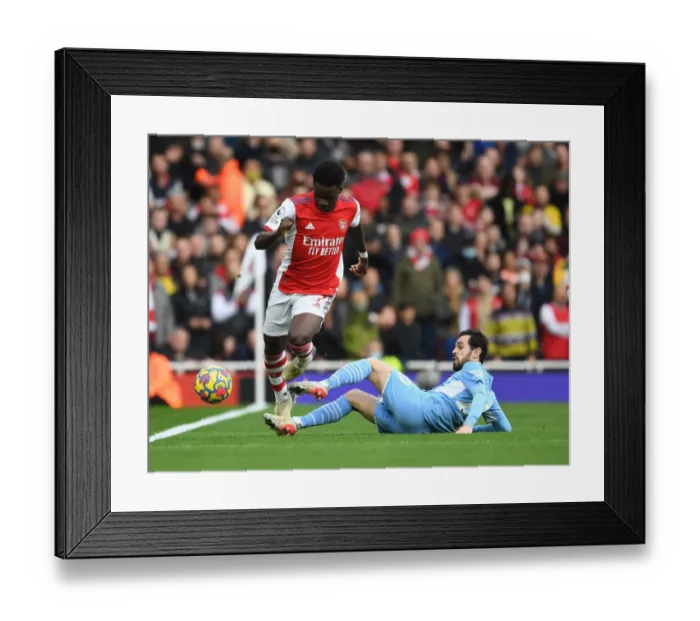Framed Print : Saka Slices Through Silva: Arsenal's Star Outmaneuvers Manchester City's Bernardo