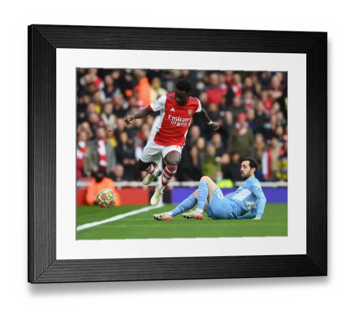 Framed Print : Saka Outsmarts Silva: Arsenal's Star Winger Dazzles Man City in Premier League Clash Framed Print : Saka Outsmarts Silva: Arsenal's Star Winger Dazzles Man City in Premier League Clash