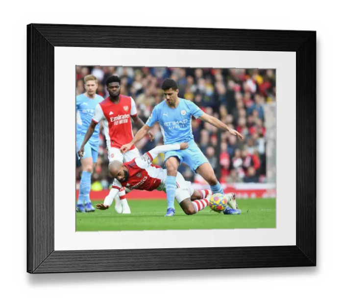 Framed Print : Clash of Titans: Lacazette vs Rodri - Arsenal vs Manchester City Showdown (2021-22)