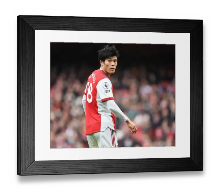 Framed Print : Arsenal's Tomiyasu Faces Manchester City in Premier League Showdown Framed Print : Arsenal's Tomiyasu Faces Manchester City in Premier League Showdown