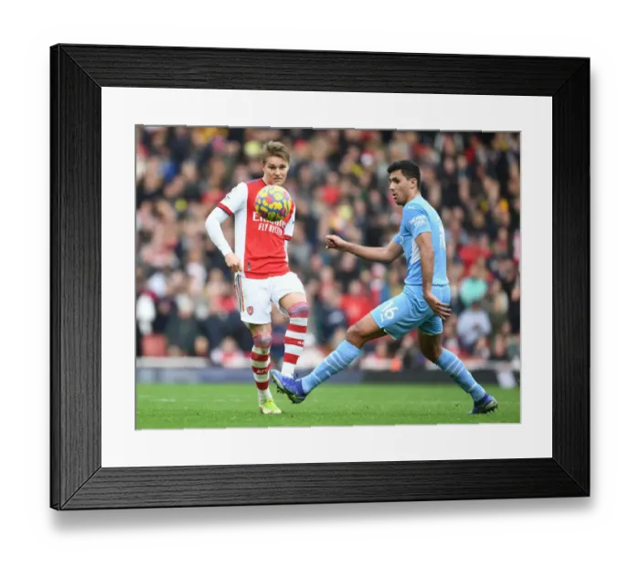 Framed Print : Odegaard vs Rodri: A Premier League Battle at the Emirates Framed Print : Odegaard vs Rodri: A Premier League Battle at the Emirates