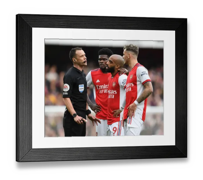 Framed Print : Arsenal vs Manchester City: Intense Discussion Between Players and Referee
