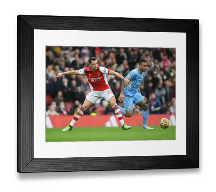 Framed Print : Arsenal vs Manchester City: Xhaka vs Jesus Clash in Premier League Showdown