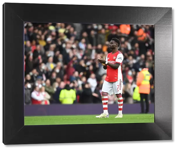 Arsenal's Bukayo Saka Celebrates with Fans After Hard-Fought Arsenal v Manchester City Match, Premier League 2021-22