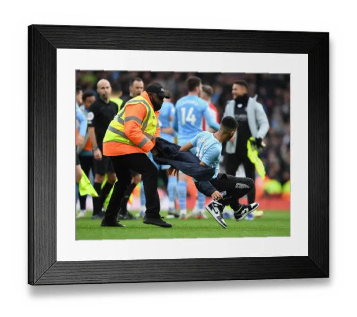 Framed Print : Arsenal vs Manchester City: Pitch Intruder Disrupted Premier League Clash