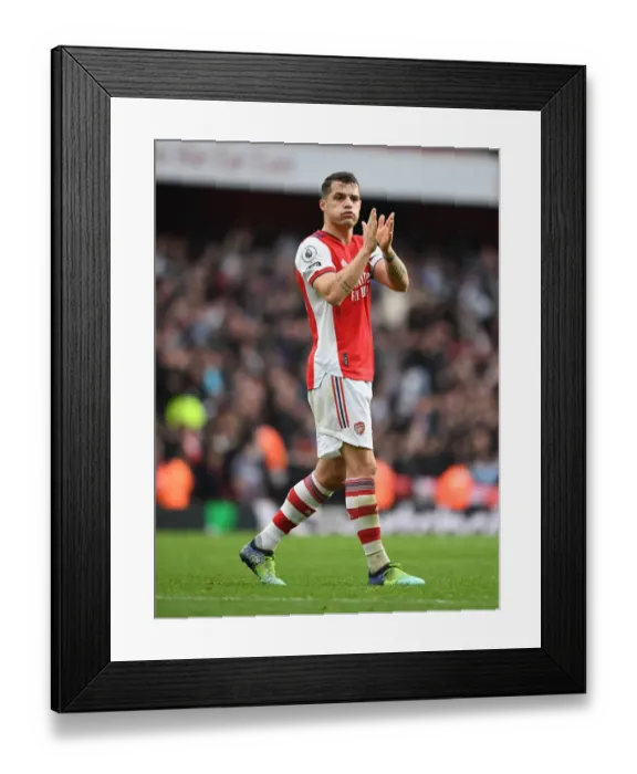 Framed Print : Granit Xhaka Salutes Arsenal Fans: Arsenal vs Manchester City, Premier League 2021-22