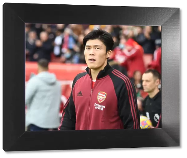Arsenal's Tomiyasu Gears Up for Arsenal vs. Manchester City Showdown (Premier League 2021-22)