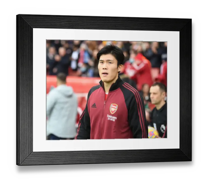 Framed Print : Arsenal's Tomiyasu Gears Up for Arsenal vs. Manchester City Showdown (Premier League 2021-22)