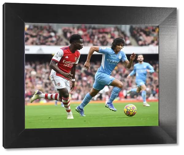 Saka Scores Spectacular Goal: Arsenal's Star Outwits Manchester City's Ake in Epic Premier League Clash