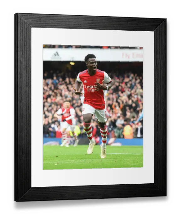 Framed Print : Saka's Stunner: Arsenal's Thrilling Victory Over Manchester City