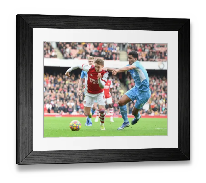 Framed Print : Arsenal vs Manchester City: Martin Odegaard vs Rodri - Premier League Clash at Emirates Stadium Framed Print : Arsenal vs Manchester City: Martin Odegaard vs Rodri - Premier League Clash at Emirates Stadium