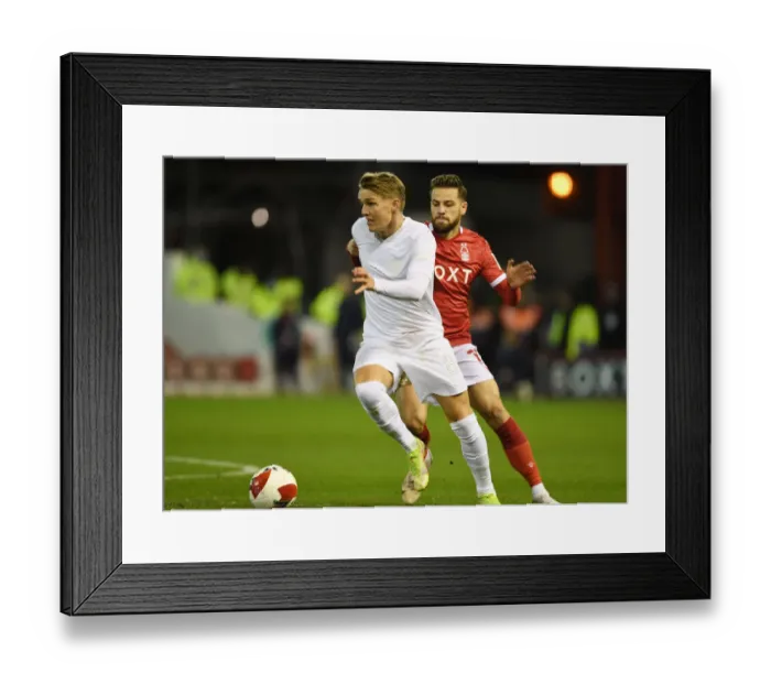 Framed Print : Martin Odegaard in FA Cup Action: Arsenal vs Nottingham Forest (2021-22) Framed Print : Martin Odegaard in FA Cup Action: Arsenal vs Nottingham Forest (2021-22)