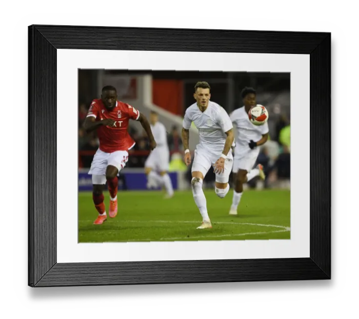 Framed Print : Arsenal's Ben White Stands Firm in FA Cup Showdown Against Nottingham Forest's Keinan Davis Framed Print : Arsenal's Ben White Stands Firm in FA Cup Showdown Against Nottingham Forest's Keinan Davis