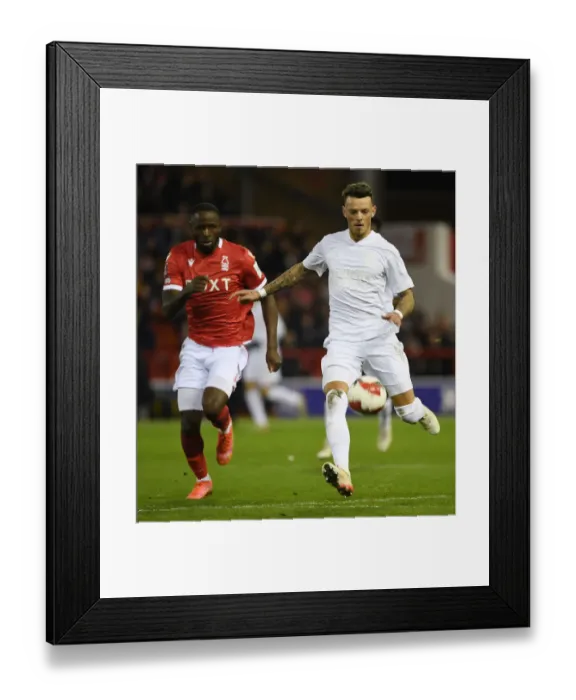 Framed Print : Arsenal's Ben White Stands Firm in FA Cup Battle Against Keinan Davis Framed Print : Arsenal's Ben White Stands Firm in FA Cup Battle Against Keinan Davis