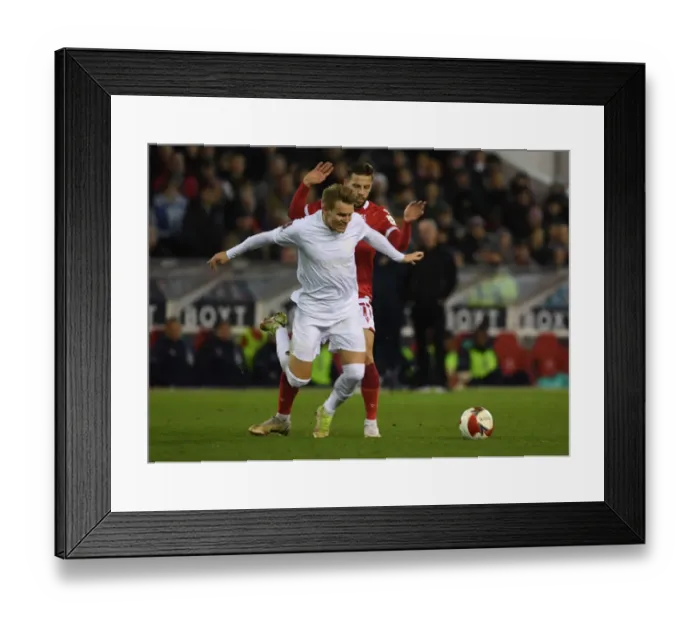 Framed Print : Nottingham Forest vs Arsenal: Tense FA Cup Clash at City Ground Framed Print : Nottingham Forest vs Arsenal: Tense FA Cup Clash at City Ground