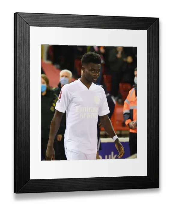 Framed Print : Arsenal's Bukayo Saka Prepares for Nottingham Forest FA Cup Clash Framed Print : Arsenal's Bukayo Saka Prepares for Nottingham Forest FA Cup Clash