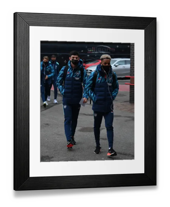 Framed Print : Arsenal Players Arrive at Nottingham Forest's City Ground for FA Cup Third Round Match