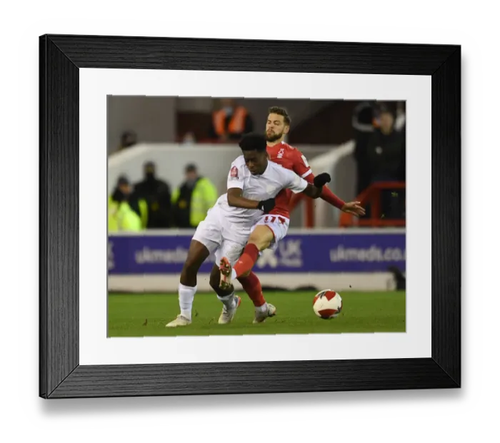 Framed Print : Nottingham Forest vs Arsenal: FA Cup Third Round Clash - Arsenal's Lokonga Fouled by Forest's Zinckernagel