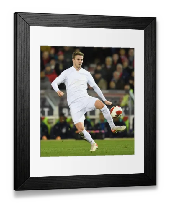 Framed Print : Rob Holding in FA Cup Action: Arsenal vs Nottingham Forest (2021-22)