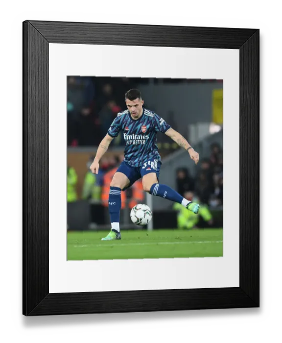 Framed Print : Granit Xhaka's Unwavering Focus: Arsenal's Midfield Maestro in Carabao Cup Battle Against Liverpool Framed Print : Granit Xhaka's Unwavering Focus: Arsenal's Midfield Maestro in Carabao Cup Battle Against Liverpool