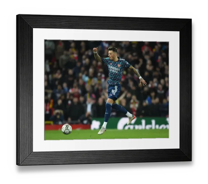 Framed Print : Arsenal's Ben White Stands Firm Against Liverpool in Carabao Cup Semi-Final Clash Framed Print : Arsenal's Ben White Stands Firm Against Liverpool in Carabao Cup Semi-Final Clash