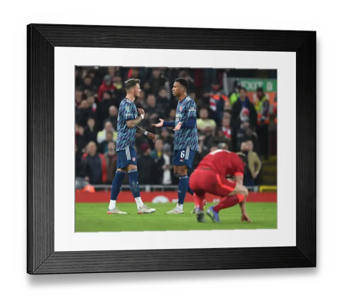 Framed Print : Arsenal's White and Gabriel Clash Heads in Intense Carabao Cup Semi-Final Battle Against Liverpool Framed Print : Arsenal's White and Gabriel Clash Heads in Intense Carabao Cup Semi-Final Battle Against Liverpool