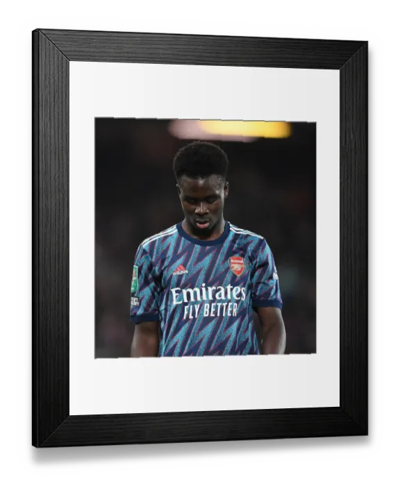 Framed Print : Bukayo Saka: Arsenal Star Shines Bright in Carabao Cup Semi-Final Clash Against Liverpool