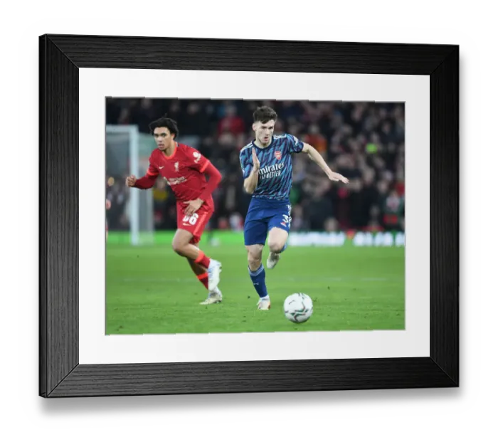 Framed Print : Arsenal's Kieran Tierney Faces Off Against Liverpool in Carabao Cup Semi-Final Clash Framed Print : Arsenal's Kieran Tierney Faces Off Against Liverpool in Carabao Cup Semi-Final Clash