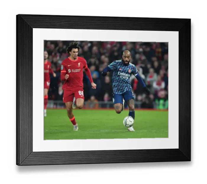 Framed Print : Alexis Lacazette Breaks Past Trent Alexander-Arnold in Carabao Cup Semi-Final Clash: Liverpool vs. Arsenal
